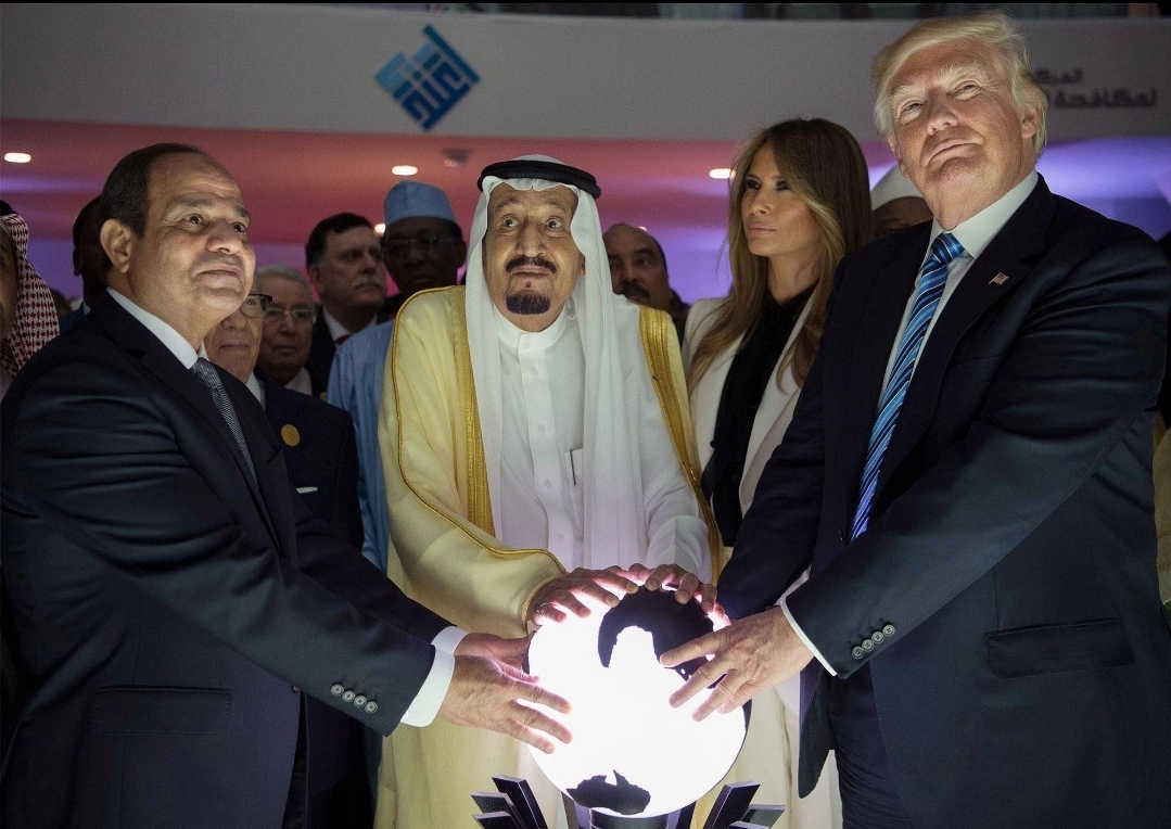 Donald Trump and Saudi businessman holding glowing orb of the world 