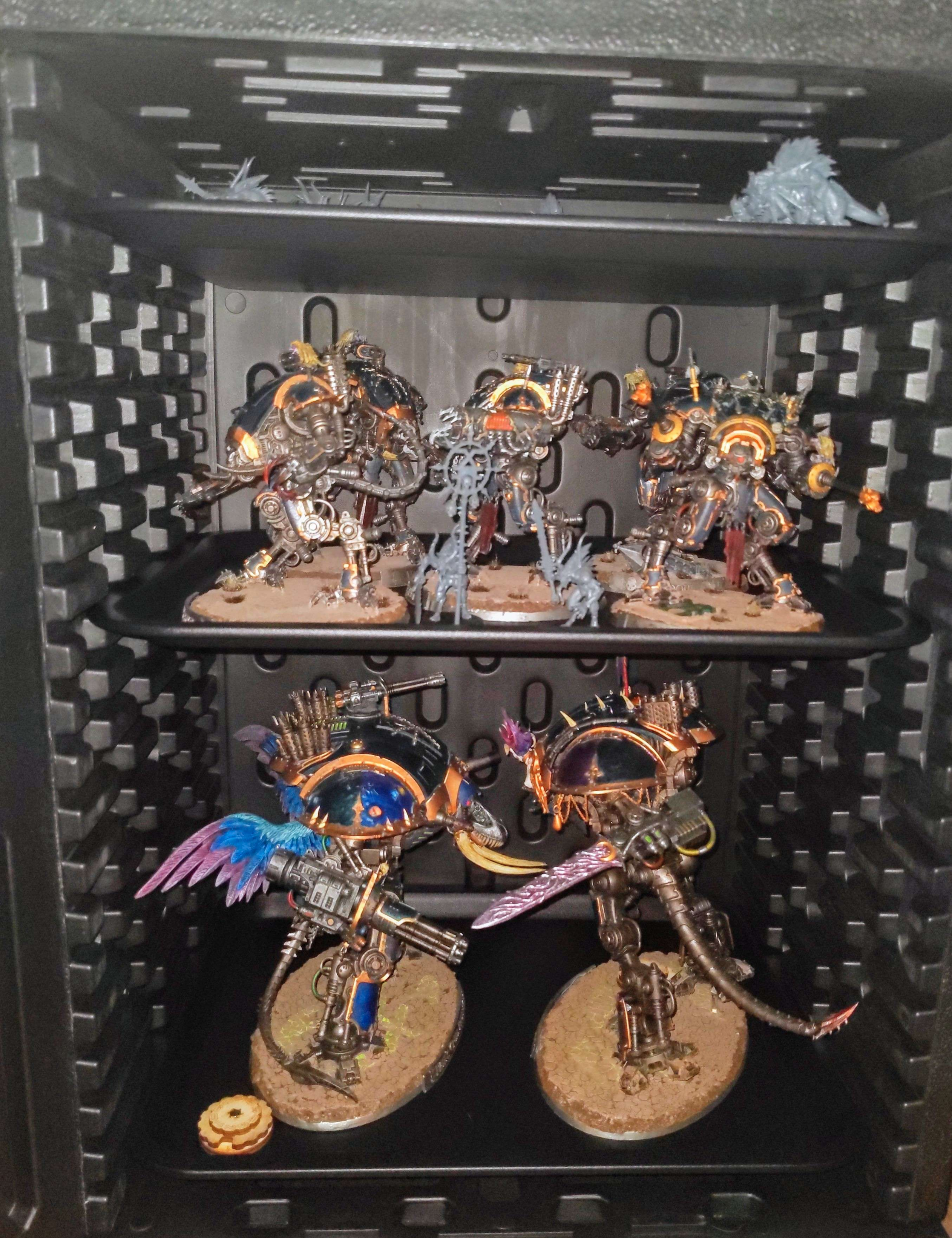 Jucoci miniature transport case holding an entire Chaos Knights army plus allied daemons.